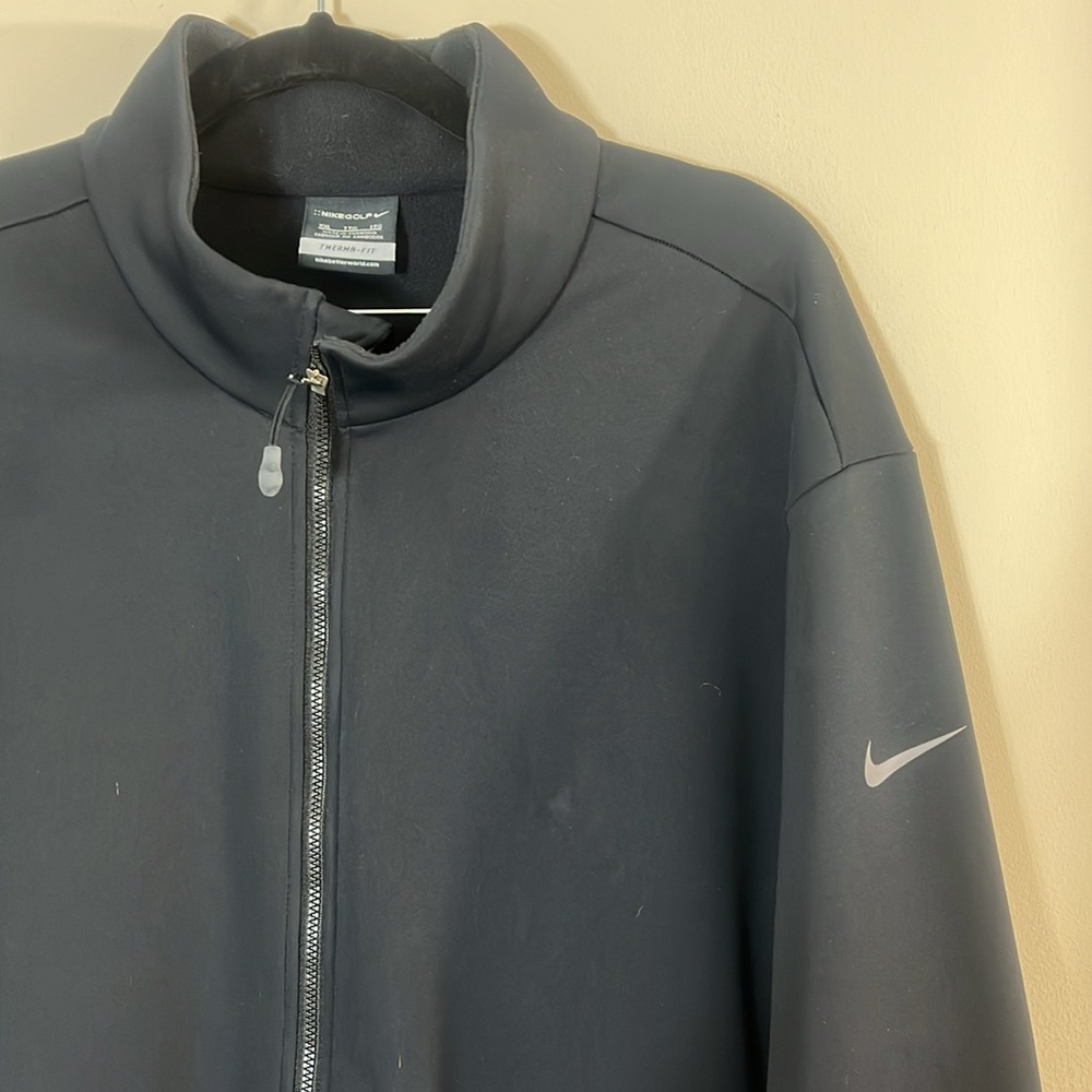 Nike Golf Black Therma-Fit Full Zipper Jacket with White Swoosh & Side Pockets